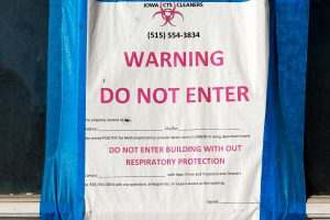 A sign on an apartment building in Washington, Iowa undergoing decontamination methamphetamine contamination on Nov. 19, 2017. 