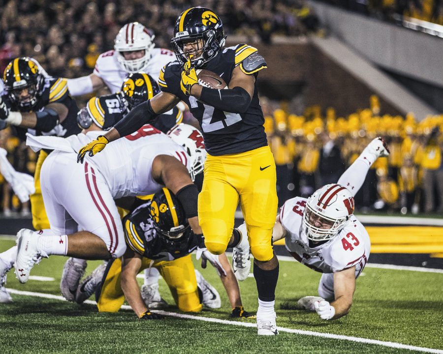 Iowa+running+back+Ivory+Kelly-Marthin+carries+the+ball+during+Iowas+game+against+Wisconsin+at+Kinnick+Stadium+on+Saturday%2C+September+22%2C+2018.+The+Badgers+defeated+the+Hawkeyes+28-17.