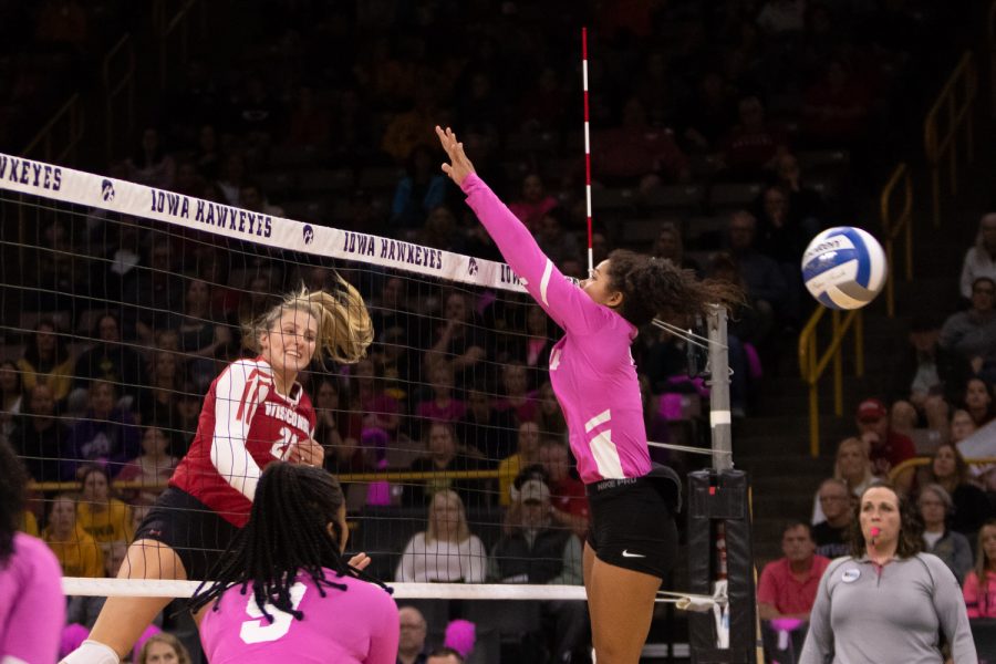 Wisconsin's Grace Loberg slams the ball over the net during a volleyball match against Iowa on Saturday, Oct. 6, 2018. The Hawkeyes defeated the number six ranked Badgers 3-2. 