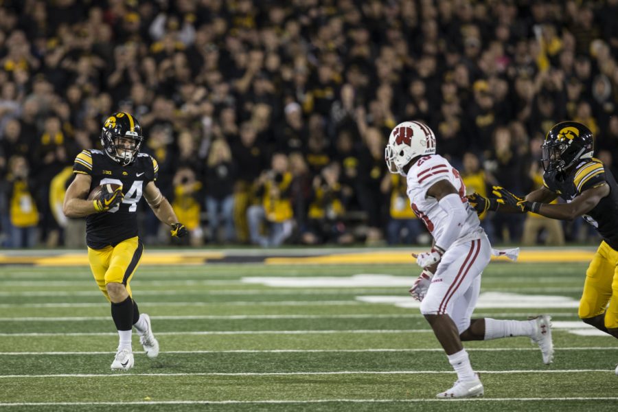 Iowa's Nick Easley evades the defense during a football game between Iowa and Wisconsin on Saturday, Sept. 22, 2018. The Badgers defeated the Hawkeyes, 28-17. 