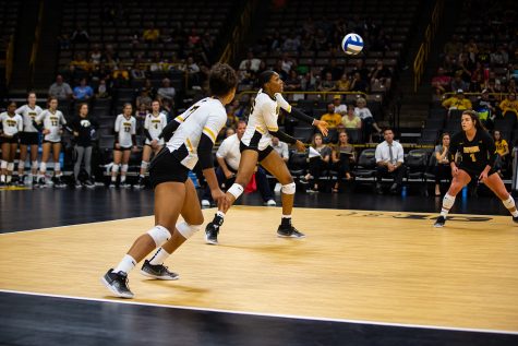 Taylor Louis keeps the ball in play during Iowas match against Michigan at Carver-Hawkeye Arena on Sept. 23, 2018.  