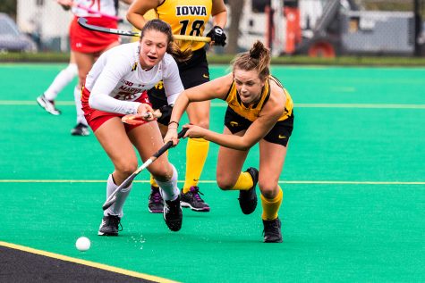 Iowa forward Maddy Murphy chases the ball to the sideline during a field hockey match against Maryland on Sunday, Oct. 14, 2018. The no. 2 ranked Terrapins defeated the no. 8 ranked Hawkeyes 2-1. 