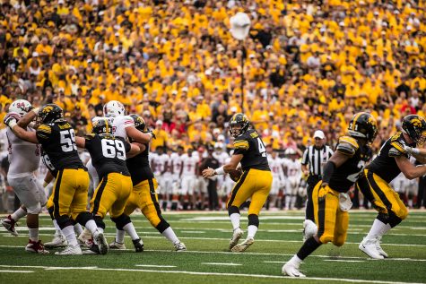 Iowa quarterback Nate Stanley drops back during Iowas game against Northern Illinois at Kinnick Stadium on Saturday, September 1, 2018. during Iowas game against Northern Illinois at Kinnick Stadium on Saturday, September 1, 2018. The Hawkeyes defeated the Huskies 33-7.