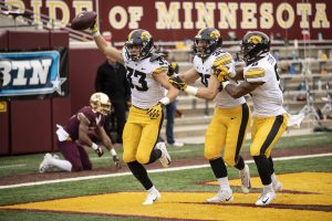 Iowa cornerback Riley Moss (33) celebrates an interception with teammates Jake Gervase (30) and Geno Stone (8) during Iowa’s game against Minnesota at TCF Bank Stadium on Saturday, Oct. 6, 2018. The Hawkeyes defeated the Golden Gophers 48-31. 