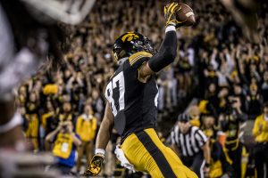 Iowa tight end Noah Fant celebrates scoring a touchdown during Iowas game against Wisconsin at Kinnick Stadium on Saturday, Sept. 22, 2018. The Badgers defeated the Hawkeyes 28-17.
