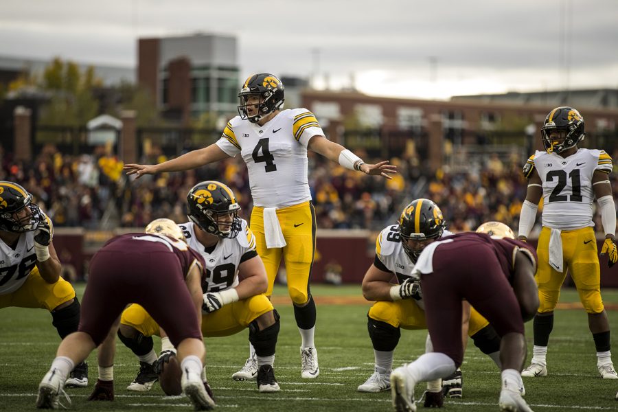 Iowa+quarterback+Nate+Stanley+calls+an+audible+during+Iowas+game+against+Minnesota+at+TCF+Bank+Stadium+on+Saturday%2C+Oct.+6%2C+2018.+The+Hawkeyes+defeated+the+Golden+Gophers+48-31.