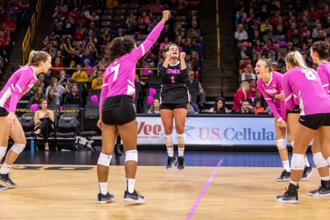 Iowas Molly Kelly celebrates after Iowa scores during a volleyball match against Wisconsin on Saturday, Oct. 6, 2018. The Hawkeyes defeated the number six ranked Badgers 3-2. 