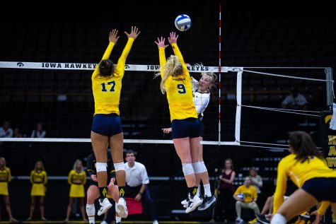 Cali Hoye spikes the ball during Iowas match against Michigan at Carver-Hawkeye Arena on September 23, 2018. The Hawkeyes were defeated 3-1. (Megan Nagorzanski/The Daily Iowan)