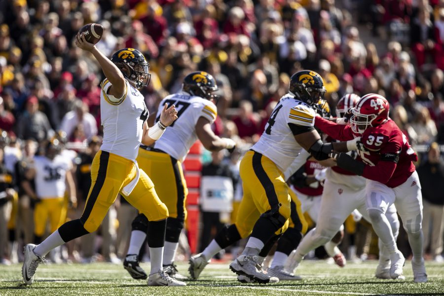 Iowa quarterback Nate Stanley throws a pass during Iowa's game against Indiana at Memorial Stadium in Bloomington on Saturday, October 13, 2018. The Hawkeyes lead the Hoosiers 21-10 at the half.