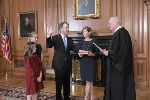 Retired Justice Anthony M. Kennedy administers the Judicial Oath to Judge Brett M. Kavanaugh in the Justices Conference Room at the Supreme Court Building on Oct. 6, 2018 in Washington, D.C. Mrs. Ashley Kavanaugh holds the Bible. (Fred Schilling/Sipa USA/TNS)