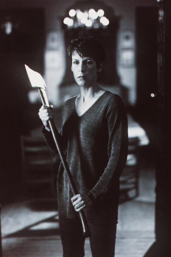 Jamie Lee Curtis holds an ax during a scene from her film Halloween: H20.