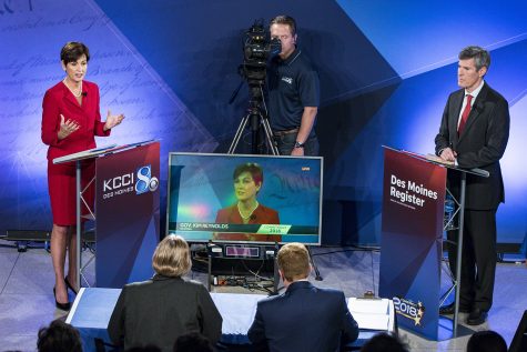Republican Iowa Gov. Kim Reynolds and Democratic challenger Fred Hubbell face each other for the first time in a debate hosted by the Des Moines Register and KCCI Wednesday, Oct. 10, 2018, at Des Moines Area Community College in Ankeny, Iowa. 