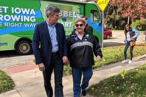 Democratic candidate for governor Fred Hubbell stops by a canvassing event in Iowa City on Oct. 27. Walking with him is Iowa representative Mary Mascher, of Iowa City. 
