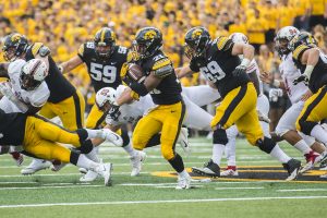 Iowa running back Ivory Kelly-Martin runs with the ball during the Iowa/NIU football game at Kinnick Stadium on Saturday, Sept. 1, 2018. The Hawkeyes defeated the Huskies, 33-7.