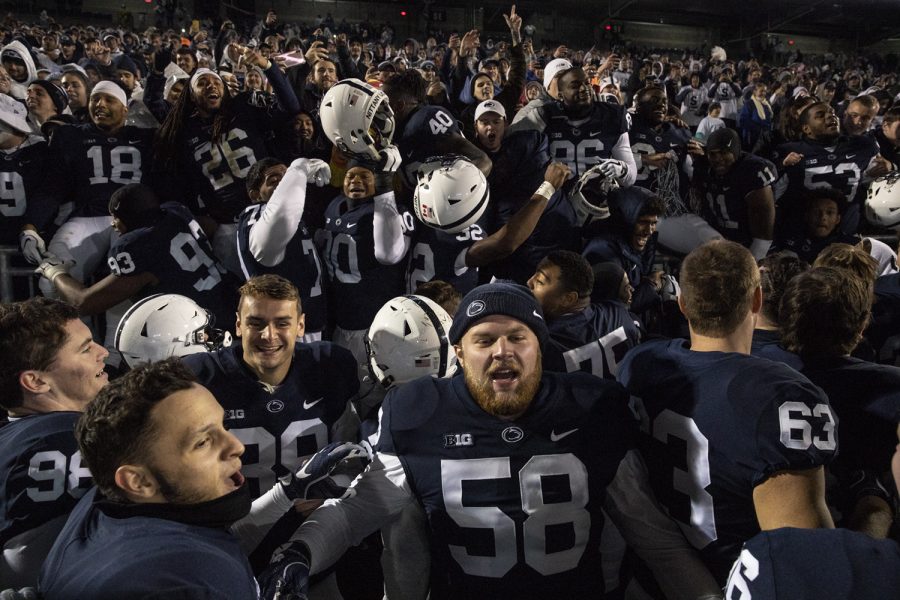 Penn State players celebrate in front of the student section  after Iowa's game against Penn State at Beaver Stadium on Saturday, October 27, 2018. The Nittany Lions defeated the Hawkeyes 30-24.