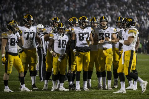The Iowa offense Huddles during Iowas game against Penn State at Beaver Stadium on Saturday, October 27, 2018. The Nittany Lions defeated the Hawkeyes 30-24.