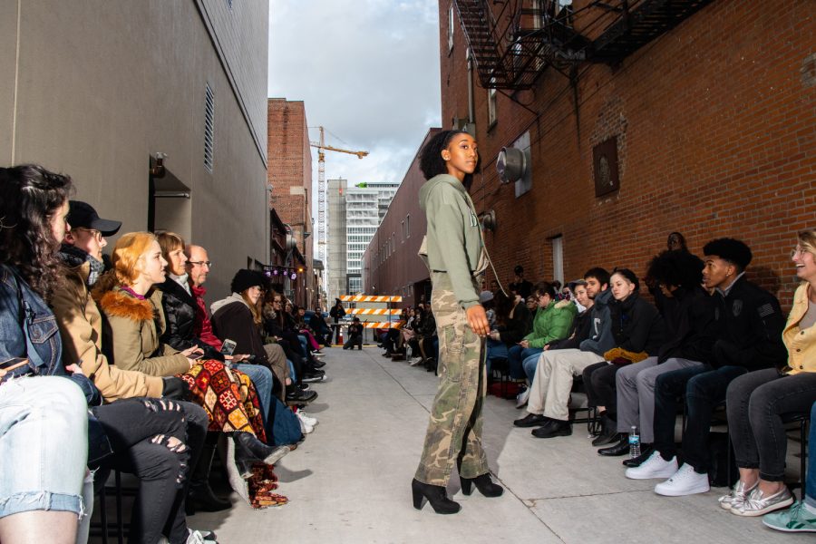 Models walk for the Unique 3 Alley Fashion show behind the Englert Theater during the Witching Hour Festival on Friday, October 12, 2018. The local brand Born Leaders United, created by Andre Wright, debuted their new streetwear line Unseen.
