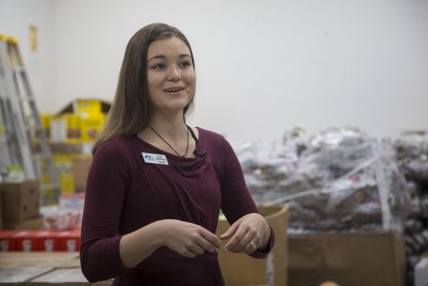 Carly Matthew, Communications Coordinator for the Johnson County Crisis Center, speaks with members of the media in the Johnson County Crisis Center in Iowa City on Wednesday Oct. 10, 2018. The Crisis Center will giving away one free roll of toilet paper to every family that stops at the center throughout the month of October. 