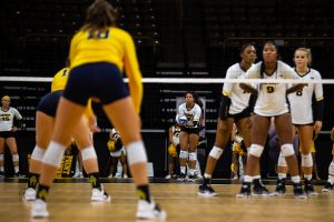 Iowas Brie Orr gets ready to serve during Iowas match against Michigan at Carver-Hawkeye Arena on Sept. 23, 2018. The Hawkeyes were defeated 3-1. 
