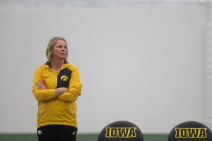 Iowa head coach Sasha Schmid watches a match during the Iowa-Creighton match at the Hawkeye Tennis and Recreation Complex on Saturday, Jan. 21, 2017. The Hawkeyes defeated the Blue Jays, 7-0. 