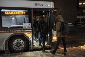 Commuters load and unload busses at the Downtown interchange in Iowa City on Wednesday, Feb. 7, 2018. 
