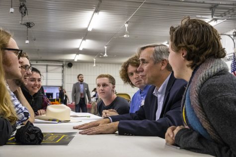 Sen. Jeff Merkley, D—Ore., speaks with the University of Iowa College Democrats at the Johnson County Democratic Party Fall Barbeque. Merkley was part of a collection of both state and national politicians who spoke at the event. 