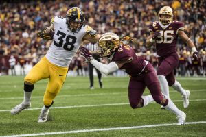 Iowa tight end T.J. Hockenson scores on a fake field goal during Iowas game against Minnesota at TCF Bank Stadium on Saturday, October 6, 2018.