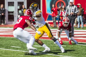 Indiana defensive back Issac James prepares to tackle Iowa wide receiver Ihmir Smith-Marsette during Iowas game at Indiana at Memorial Stadium in Bloomington on Saturday, October 13, 2018. The Hawkeyes beat the Hoosiers 42-16.