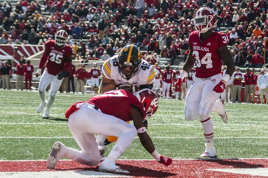 Iowa fullback Austin Kelly runs toward the end zone during Iowa's game at Indiana at Memorial Stadium in Bloomington on Saturday, October 13, 2018. The Hawkeyes beat the Hoosiers 42-16.