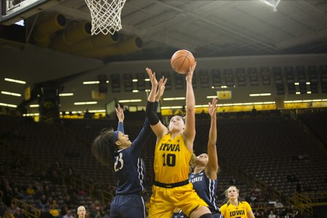 Iowa forward Megan Gustafson attempts a shot during the Iowa/Penn State basketball game at Carver-Hawkeye Arena on Thursday, Feb. 8, 2018.