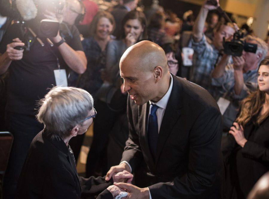 New Jersey Sen. Cory Booker talks with a supporter on Saturday, October 6, 2018. He was the key note speaker at this years Democratic Fall Gala. 