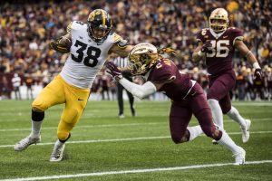 Iowa tight end T.J. Hockenson scores on a fake field goal during Iowas game against Minnesota at TCF Bank Stadium on Saturday, Oct. 6, 2018.