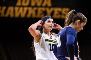 Iowa forward Megan Gustafson #10 adjusts her headband during a break in play during a womens basketball game against Oral Roberts University on Friday, Nov. 9, 2018. The Hawkeyes defeated the Golden Eagles 90-77. 