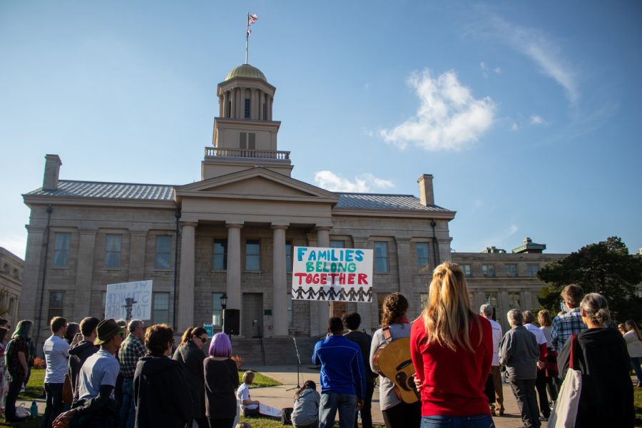 Community members partake in an immigration reform rally at the Pentacrest on Oct. 27, 2018. Iowans who have been negatively impacted by immigration shared their stories during the rally.