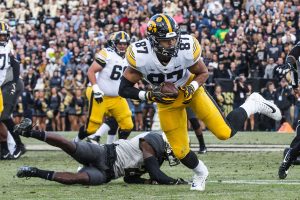 Iowa tight end Noah Fant breaks free from an attempted tackle by Purdue cornerback Kenneth Major during the Iowa/Purdue game at Ross-Ade Stadium in West Lafayette, Ind. on Saturday, November 3, 2018. The Boilermakers defeated the Hawkeyes 38-36. 