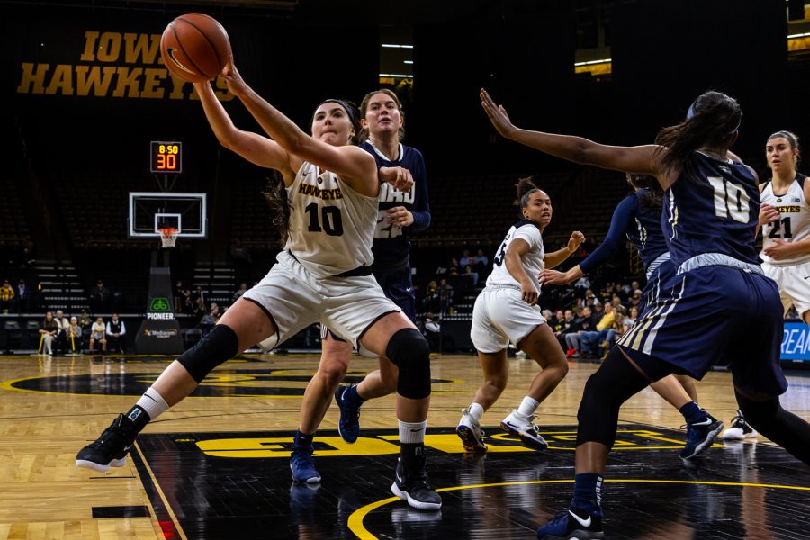 Iowa+forward+Megan+Gustafson+%2310+fights+for+an+offensive+rebound+during+a+womens+basketball+game+against+Oral+Roberts+University+on+Friday%2C+Nov.+9%2C+2018.+The+Hawkeyes+defeated+the+Golden+Eagles+90-77.+%28David+Harmantas%2FThe+Daily+Iowan%29