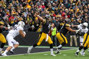 Iowa quarterback Nate Stanley (4) drops back to pass during a game against Northwestern University on Saturday, Nov. 10, 2018 at Kinnick Stadium in Iowa City. The Wildcats defeated the Hawkeyes 14-10. 