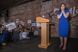 Democratic candidate for Iowa’s first congressional district Abby Finkenauer is greeted by supporters during a watch party at 7 Hills Brewing Company in Dubuque, Iowa on Tuesday Nov. 6, 2018. Finkenauer defeated incumbent Republican Rod Blum and, along with Alexandria Ocasio-Cortez, NY-14, becomes one of the first women under 30 elected to the U.S. House of Representatives. 
