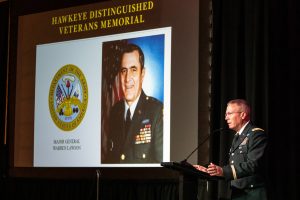 Col. David Nixon of the Iowa Army National Guard receives a Hawkeye Distinguished Veterans Award on behalf of Maj. Gen. Warren Lawson at the IMU on Thursday, Nov. 15, 2018. Lawson played center for the Iowa football team as an undergrad and was the teams MVP in 1954. 