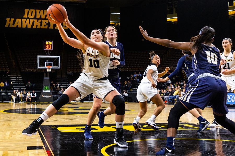 Iowa forward Megan Gustafson (10) fights for an offensive rebound during a womens basketball game against Oral Roberts University on Friday, Nov. 9, 2018. The Hawkeyes defeated the Golden Eagles 90-77. 