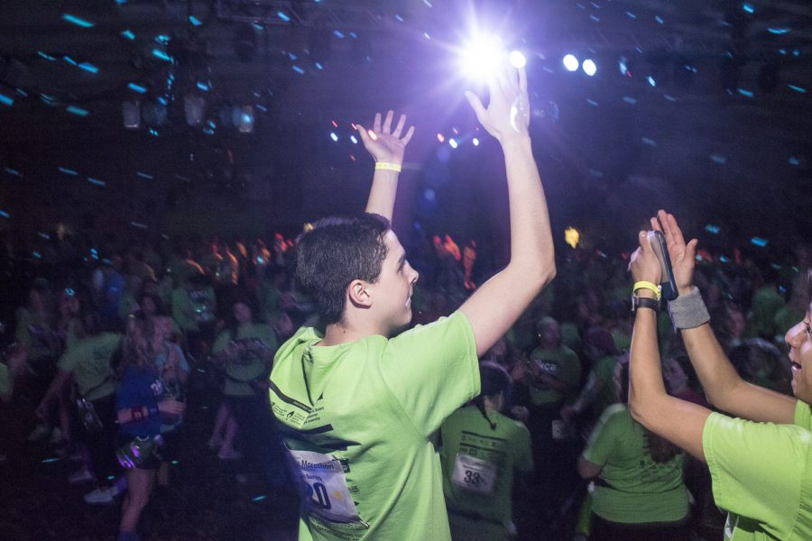 Dancers on the stage motivate the crowd at Dance Marathon in the Iowa Memorial Union on Friday, Feb. 2, 2018. (James Year/The Daily Iowan)