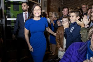 Democratic candidate for Iowa’s 1st Congressional District Abby Finkenauer is greeted by supporters during a watch party at 7 Hills Brewing Company in Dubuque on Tuesday, Nov. 6, 2018. Finkenauer defeated incumbent Republican Rod Blum and, along with Alexandria Ocasio-Cortez, NY-14, has become one of the first women under 30 elected to the U.S. House of Representatives. 
(Nick Rohlman/The Daily Iowan)