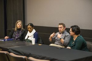 The panel speaks during the Its On Us town hall meeting hosted by UISG at the IMU on Monday, Nov. 26, 2018. UISG is remodeling its sexual assault campaign. 