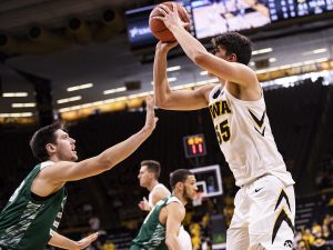 Iowa’s Luka Garza shoots a jumper at the beginning of the first half during the Iowa Vs. Green Bay basketball game. The Hawkeyes won 93-83 at Carver-Hawkeye Arena on Nov. 11.