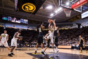 Iowa Forward Nicholas Baer attempts a jump shot during a game against Purdue University on Saturday, Jan. 20, 2018. The Boilermakers defeated the Hawkeyes 87-64. 