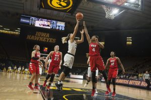 Iowa guard Makenzie Meyer taking a shot at Carver Hawkeye Arena on Saturday, Nov. 11, 2017. The Hawkeyes defeated the Lady Toppers 104-97 in overtime. 