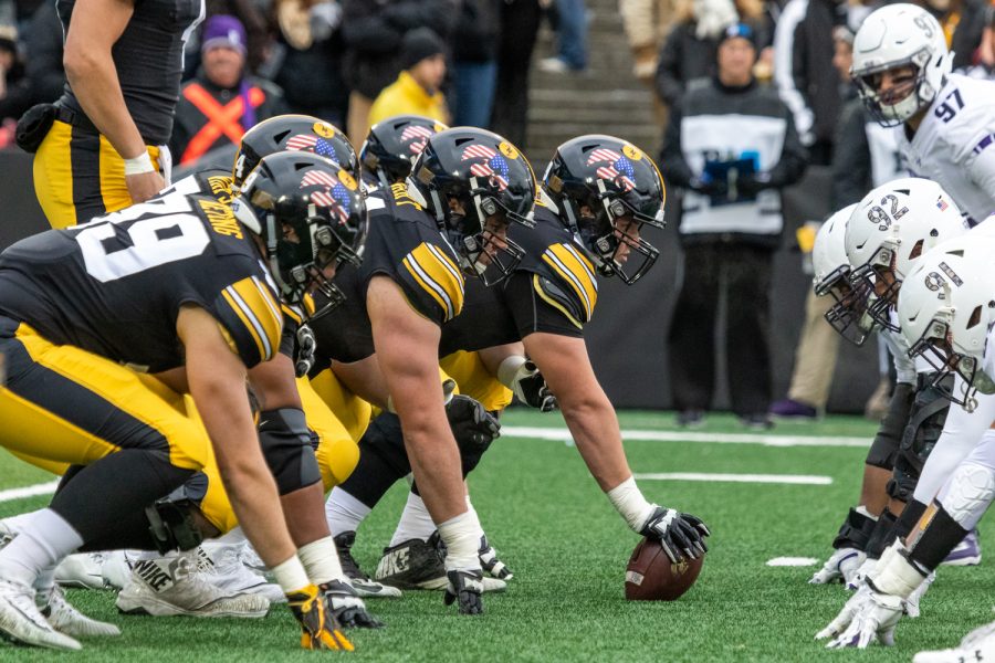 The+Iowa+offensive+line+squares+up+against+the+Northwestern+defense+during+a+game+against+Northwestern+University+on+Saturday%2C+Nov.+10%2C+2018+at+Kinnick+Stadium+in+Iowa+City.+The+Wildcats+defeated+the+Hawkeyes+14-10.