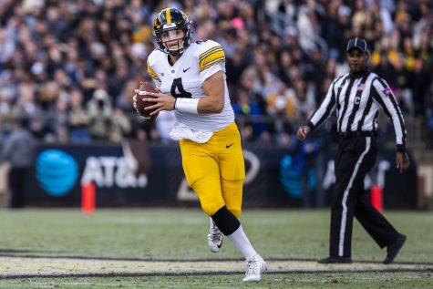 Iowa quarterback Nate Stanley prepares to throw a pass during the Iowa/Purdue game at Ross-Ade Stadium in West Lafayette on Saturday, Nov. 3, 2018. The Boilermakers defeated the Hawkeyes, 38-36. 