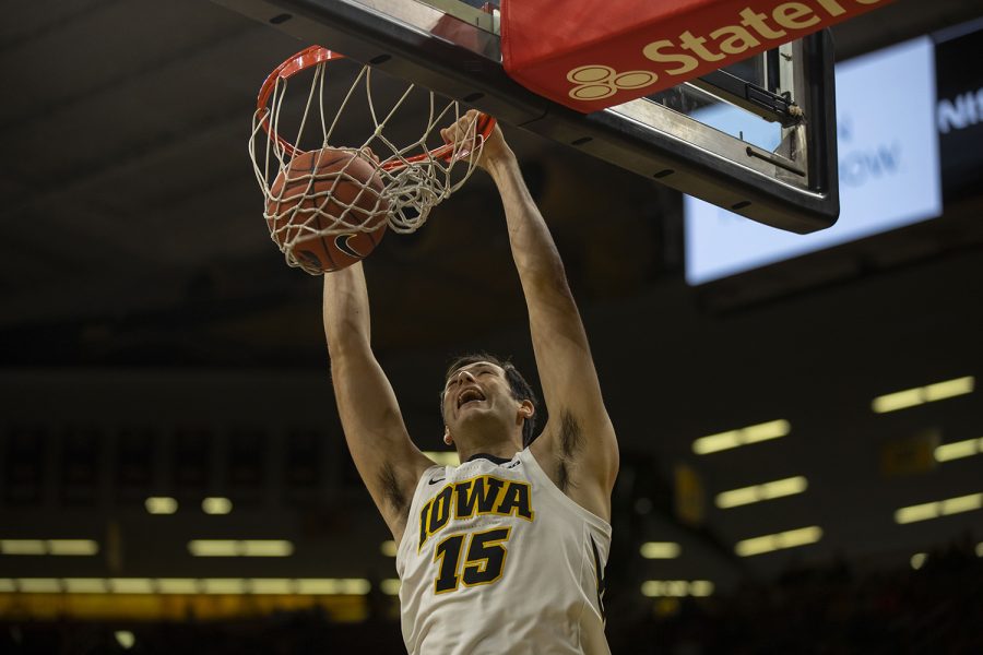 Iowa+forward+Ryan+Kriener+dunks+the+ball+during+the+Iowa%2FGuilford+College+basketball+game+at+Carver-Hawkeye+Arena+on+Sunday%2C+Nov.+4%2C+2018.+The+Hawkeyes+defeated+the+Quakers%2C+103-46.