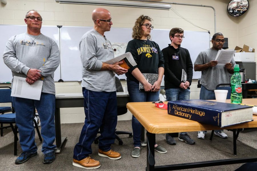 Michael Blackwell reads during a small group presentation during a "One Community, One Book" class at Oakdale Prison on Thursday, Oct. 25, 2018. The seven-week class is offered once a year through the University of Iowa's Human Rights department. The theme for this session was "Redefining the American Dream." 